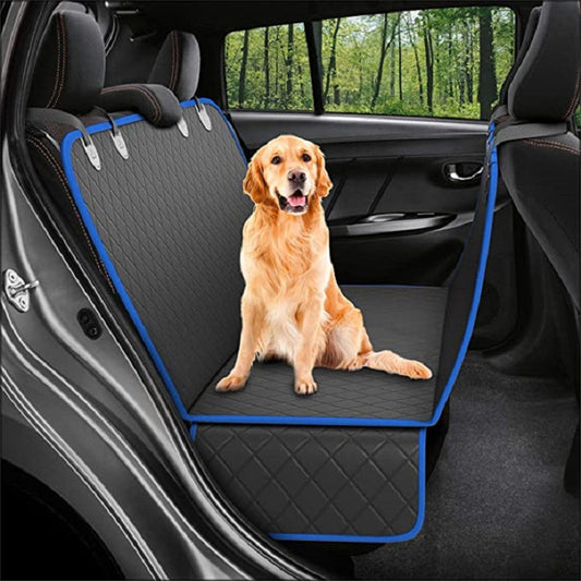 Dog car seat cover hammock with mesh window and seat belt installed in a vehicle.